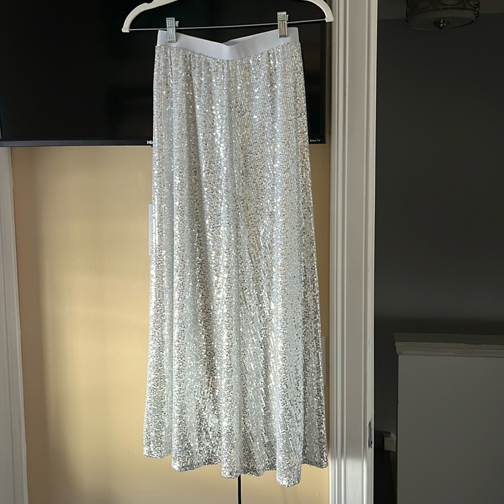 Two sequined skirts